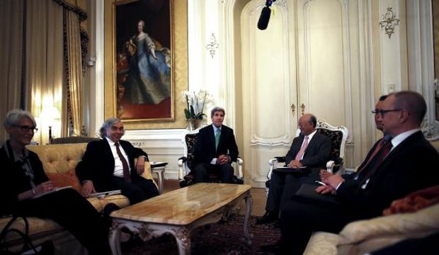 US Under Secretary for Political Affairs Wendy Sherman (L–R), US Secretary of Energy Ernest Moniz, US Secretary of State John Kerry, and Atomic Energy Agency (IAEA) Director General Yukiya Amano, meet at a hotel in Vienna, Austria, on June 29, 2015, as part of discussions on reaching a nuclear deal between Iran and Western powers. (Reuters/Carlos Barria)