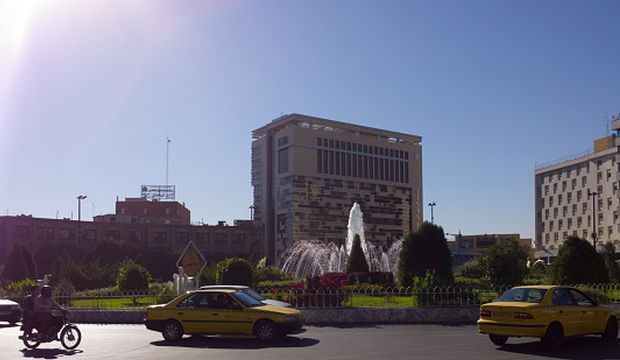 This undated file photo shows a street in the Iranian city of Mashhad, and some passing cars. (Getty Images/Rasoul Ali)