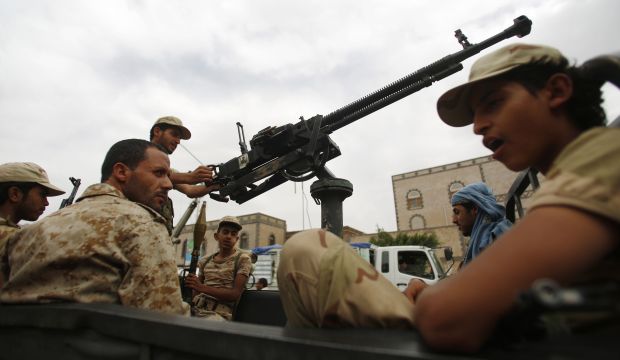 Houthi fighters wearing army uniforms ride in a pickup while patrolling in a street in Sana'a, Yemen, on July 24, 2015. (AP Photo/Hani Mohammed)