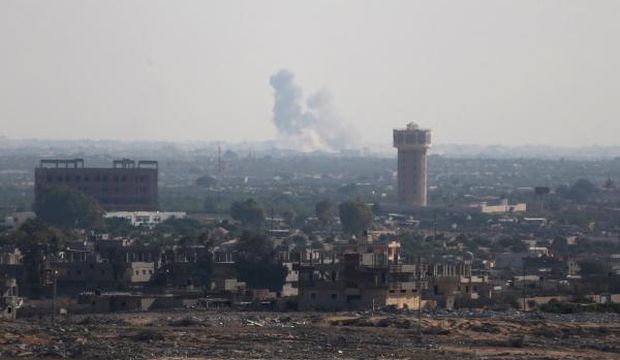Smoke rises in Egypt's North Sinai as seen from the border from the southern Gaza Strip with Egypt, on July 1, 2015. (Reuters/Ibraheem Abu Mustafa)