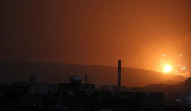 A huge explosion rocks a military weapons depot controlled by Houthi rebels as airstrikes are carried out by the Saudi-led coalition in Sana'a, Yemen, on July 5, 2015. (EPA/Yahya Arhab)