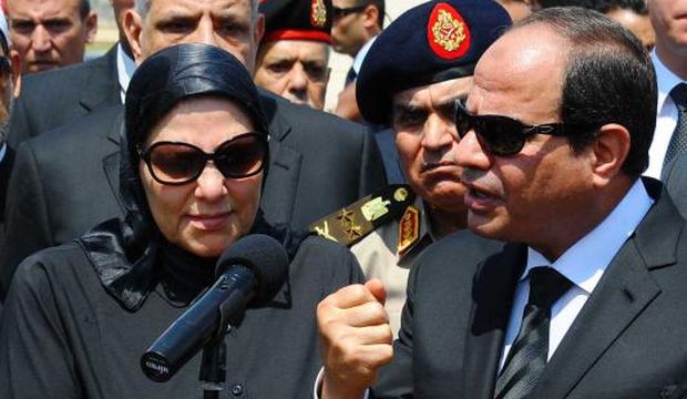 In this picture provided by the office of the Egyptian Presidency, Egyptian President Abdel-Fattah El-Sisi (R) speaks at the funeral for Hisham Barakat, the top judicial official in charge of overseeing the prosecution of thousands of Islamists, including former president Mohamed Mursi, in Cairo, on June 30, 2015. (Egyptian Presidency via AP)