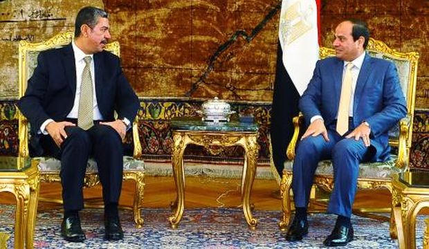 A handout picture made available by the Office of the Egyptian President shows Egyptian President Abdel-Fattah El-Sisi (R) sitting with Yemen’s Prime Minister Khaled Bahah (L), during their meeting in Cairo, Egypt, on July 12, 2015. (EPA/Office of the Egyptian President/HO)