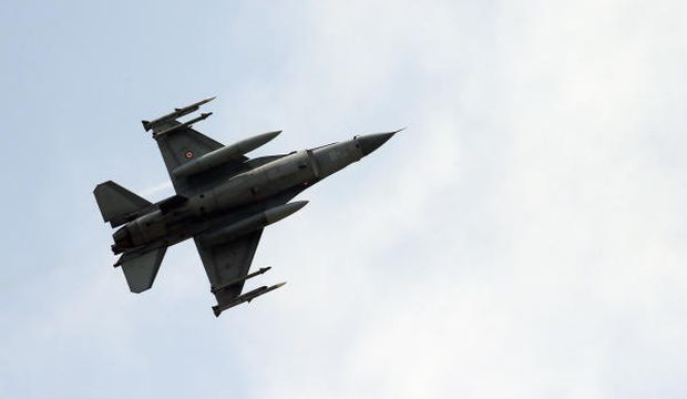 A missile-loaded Turkish Air Force warplane takes off from the Incirlik Airbase, in the outskirts of the city of Adana, southeastern Turkey, on July 28, 2015. (AP Photo/Emrah Gurel)