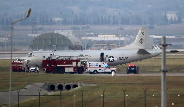 Fire trucks and an ambulance are seen next to a US Navy P-3 Orion Maritime patrol aircraft after it landed at the İncirlik Airbase in the southern city of Adana, Turkey, on July 25, 2015. (Reuters/Murad Sezer)