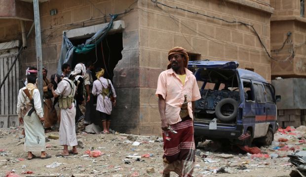 Yemenis look at the damage after Iran backed rebels fired Katyusha rockets at a busy market in Yemen's Ma'rib province, east of the capital, Sanaa, on September 11, 2015. (AFP PHOTO / ABDULLAH HASSAN)