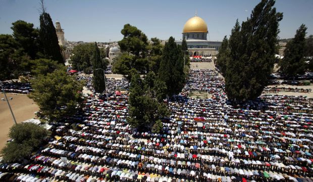 In this Friday, July 10, 2015 file photo, Palestinian men pray at the Al-Aqsa Mosque compound during the Muslim holy month of Ramadan.  (AP Photo/Mahmoud Illean, File)