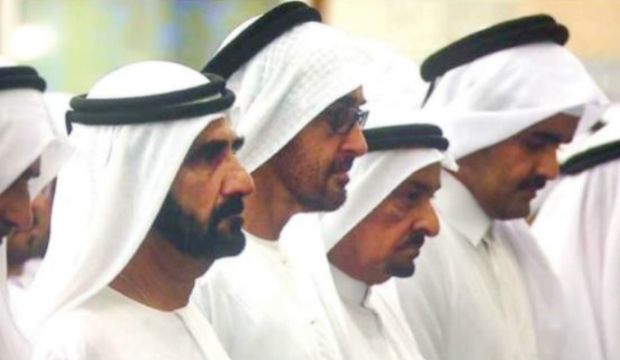 Vice President and Prime Minister of the United Arab Emirates and Ruler of Dubai Sheikh Mohammed Bin Rashid Al Maktoum (L) and Crown Prince of Abu Dhabi Mohammed Bin Zayed Al Nahyan (C) at the funeral for Sheikh Mohammed’s son Sheikh Rashid Bin Mohammed, at the Zabeel Grand Mosque in Dubai, on September 19, 2015. (WAM)