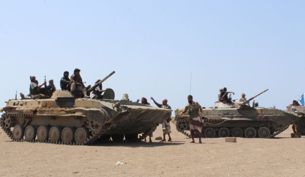 Fighters against Shi'ite rebels known as Houthis gather in the strait of Bab El-Mandeb, west of the southern port city of Aden, to take back the control of the strait, on Friday, October 2, 2015. (AP Photo/Wael Qubady)