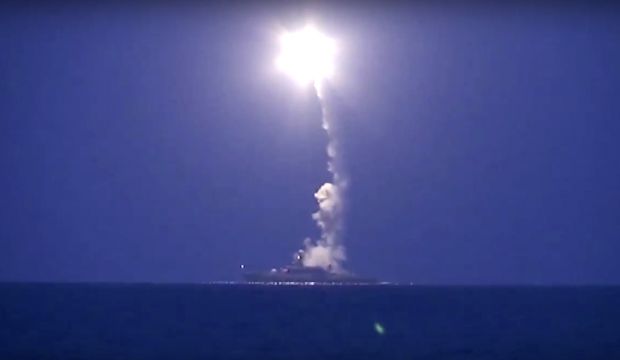 In this photo made from the footage taken from Russian Defense Ministry official web site on Wednesday, October 7, 2015, a Russian navy ship launches a cruise missile in the Caspian Sea. (Russian Defense Ministry Press Service via AP)