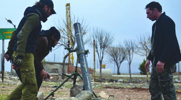 Free Syrian Army soldiers fighting ISIS with heavy weapons a few days ago in villages in rural Aleppo (Getty) 