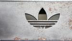 (The Adidas logo on an iron bench is pictured at the flagship store in Berlin)