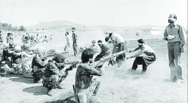 The photograph "Firing Squad in Iran" by Jahangir Razmi of Ettela'at