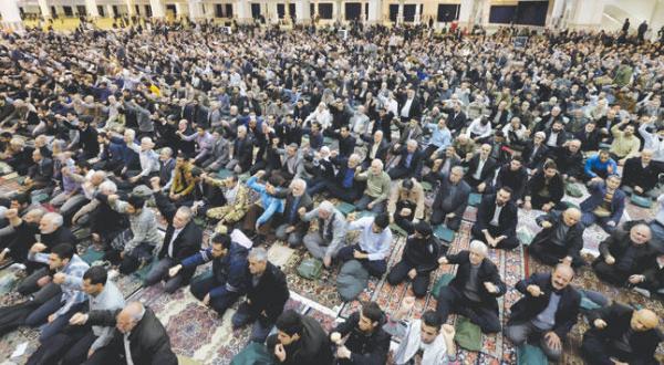 Friday prayers in Tehran yesterday (Reuters)