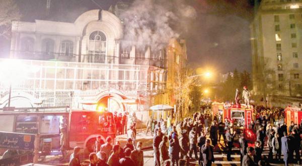 Smoke and flames rising above the Saudi Embassy in Tehran after the terrorist attack on 2nd of January (AP)