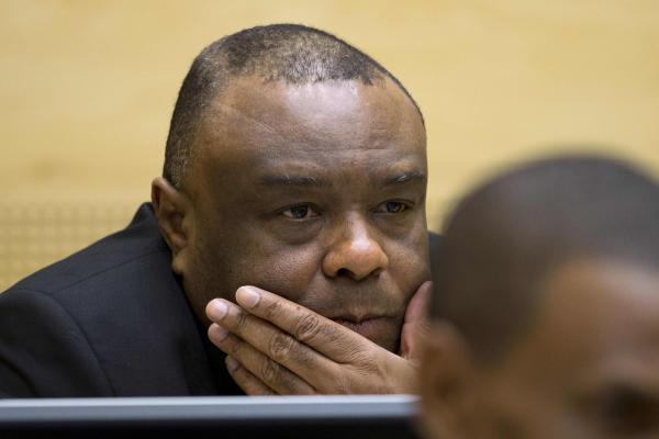 Jean-Pierre Bemba Gombo looking on in a court room of the International Criminal Court (ICC) 