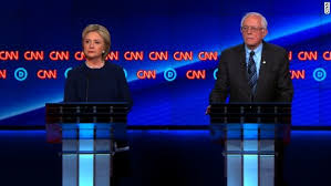 Clinton and Sanders in a democratic debate in Flint, Michigan