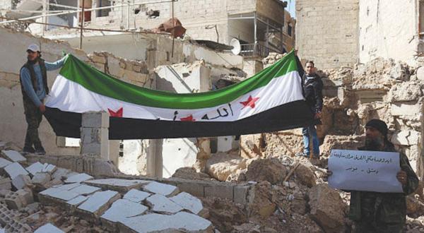 Jobar citizens lift Syrian Protests' Flag