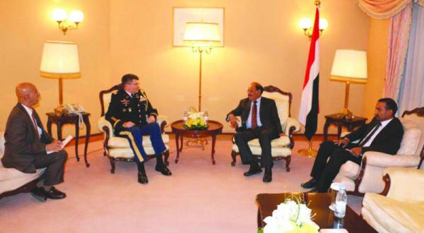 Major General Ali Mohsen al Ahmar receiving US Military Attaché David Cobbs and his deputy