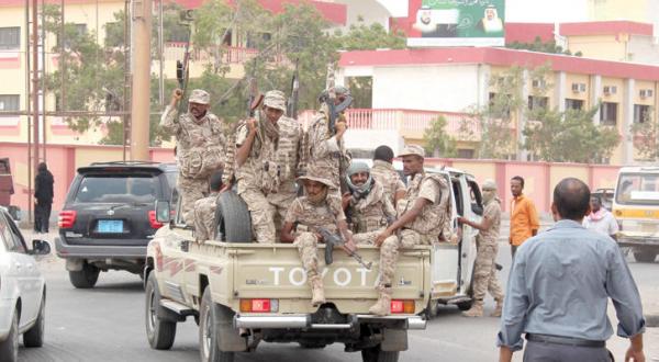 Members of the police force inside Mansoura , A.F.P