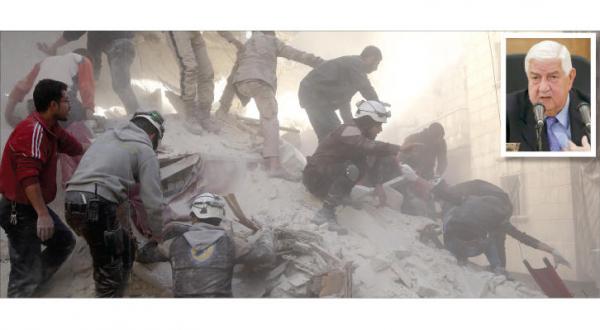 Men attempting to save victims after a Russian airstrike in Aleppo