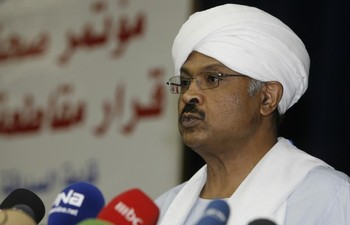 Mubarak al-Fadil of Sudan's opposition Umman Party gives a speech in Khartoum on April 9, 2010. Sudanese President Omar al-Beshir and his remaining challengers addressed supporters on the last day of campaigning for elections that have been overshadowed by opposition boycotts. AFP PHOTO/ASHRAF SHAZLY (Photo credit should read ASHRAF SHAZLY/AFP/Getty Images)