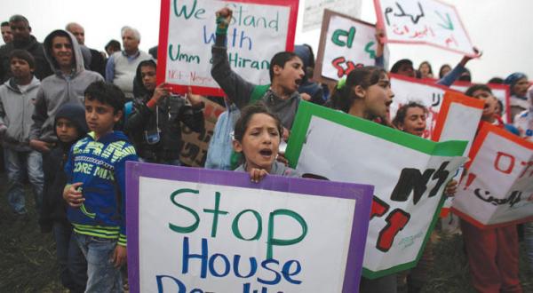 Palestinians protesting to stop Israeli policies issued against Palestinian activists