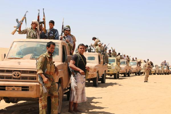Pro-Yemeni government fighters gather in a desert area ahead of an offensive against al-Qaeda-held southern towns, in the eastern province of Shabwa, Yemen, 22 February 2016.EPA/STRINGER