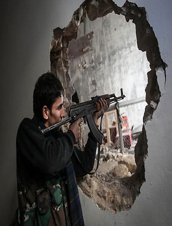 NATO warns Syria not to use chemical weapons