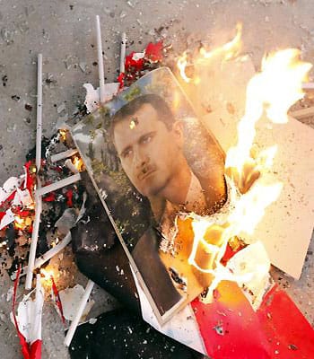 Syrian rebels fight Palestinian pro-Assad group