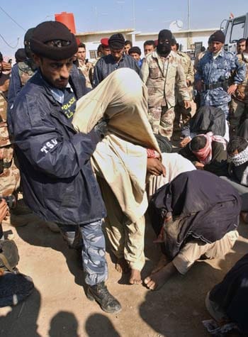 Iraqi Gunmen Strike Election Headquarters
