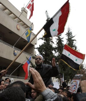 Baghdad bombings kill 16 Iraqis; Islamic leaders call for protests against drawings of prophet