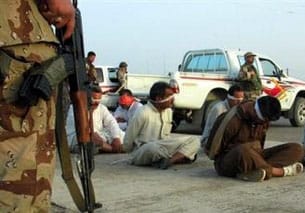 Military Investigates U.S. Guards in Iraq