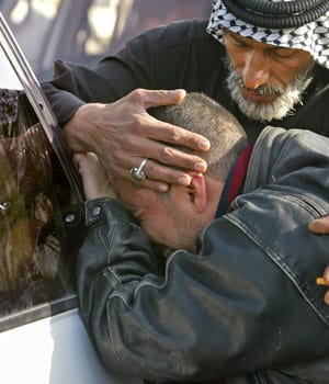 Bodies of 18 men found in Iraq; bombs reported
