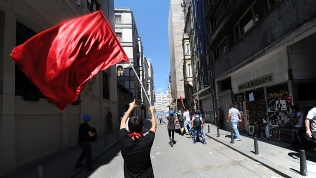 Erdogan defiant as police and demonstrators clash