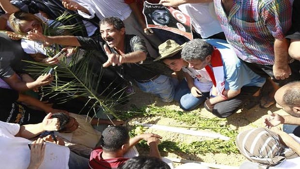 Slain Tunisian opposition figure laid to rest