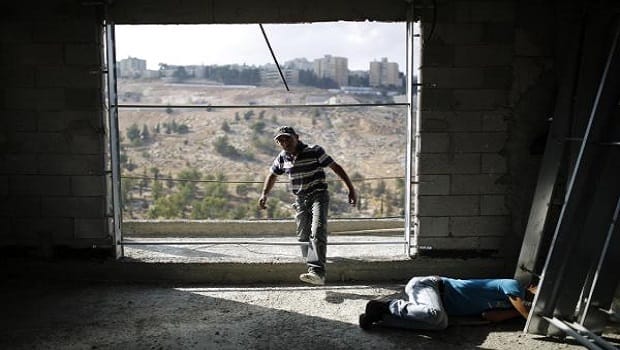Palestinians to continue talks despite settlement activity