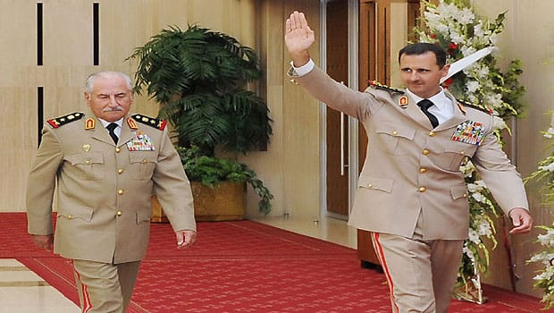 Mystery surrounds defection of former Syrian defense minister