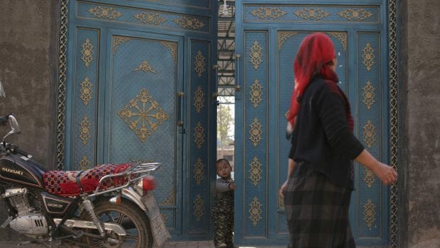 China pressures Muslim Uighur lawyer families on burqas, beards