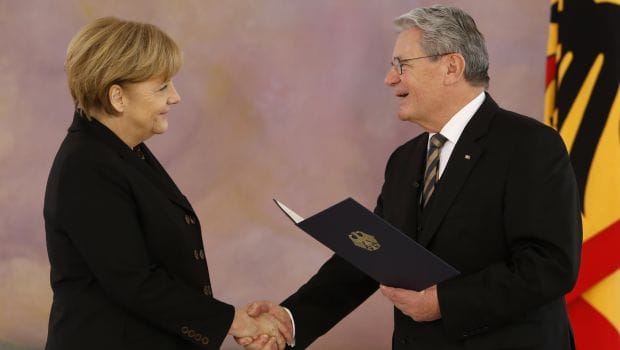 Germany’s Merkel starts 3rd term in new coalition
