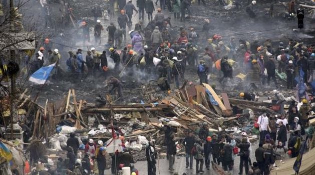 Ukraine clashes kill 21 more, EU talks shifted