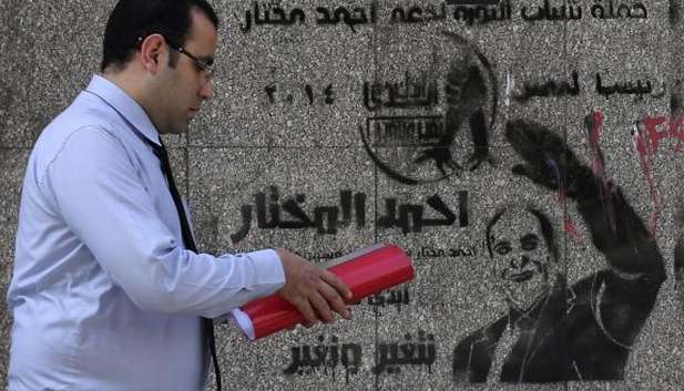 Egypt’s Sisi to continue as defense minister