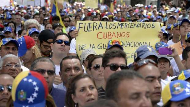 Amid protests, Venezuela to remember late Hugo Chavez