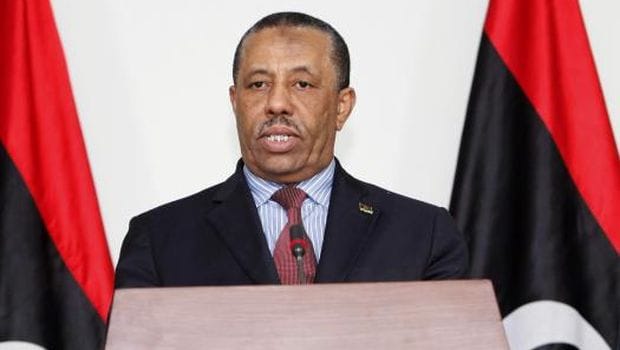 Libyan PM resigns as trial of Gaddafi sons, aides begins