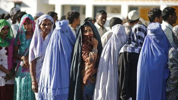 As riot-hit Indian region votes, religious divide favors Hindu leader