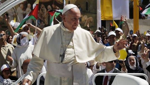 Pope Francis prays at Bethlehem wall, calls for Middle East peace