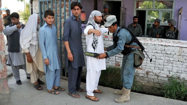 Afghans line up to vote in presidential runoff