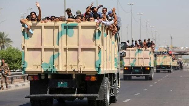 Iraq insurgent advance slows, US sends carrier to Gulf