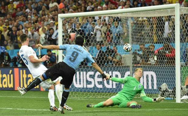 Suarez pushes England to edge of World Cup exit