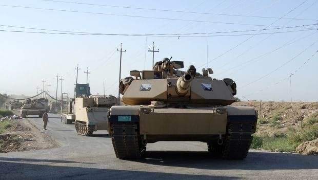 Iraqi forces clash with militants in northern city